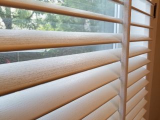 Faux Wooden Blinds | Blinds & Shades Escondido CA Bedroom with wooden blinds for windows.